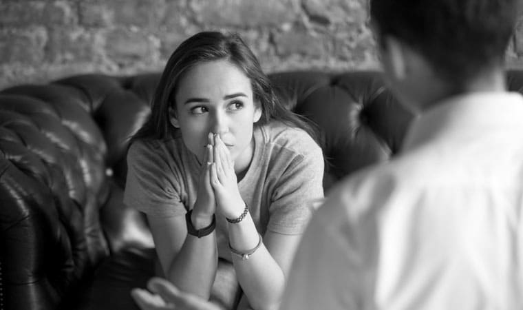 Woman opening up to spiritual director